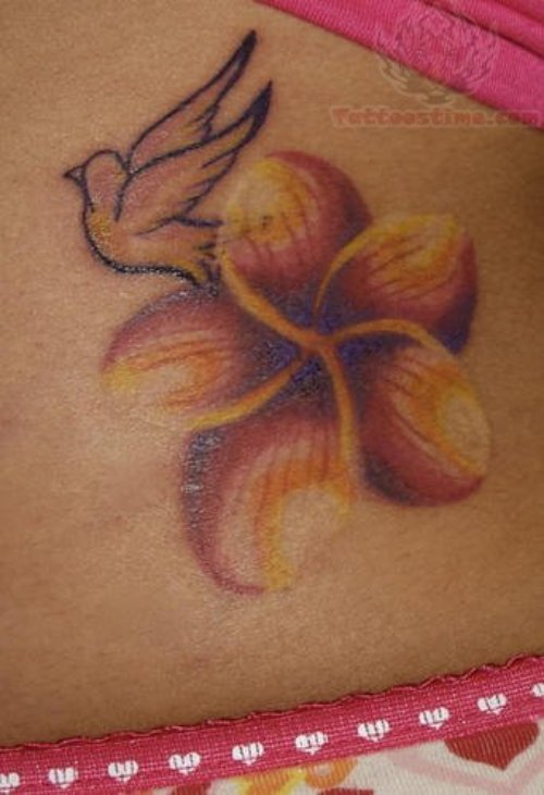 Flying Bird And Flower Tattoo On Lowerback